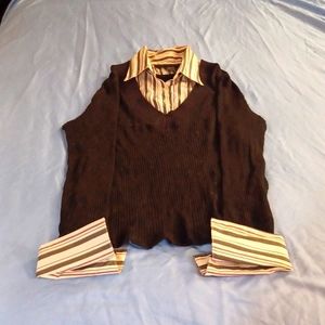 Layered black sweater with stripped blouse